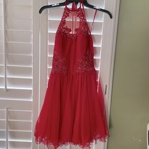 Red halter Homecoming or party dress with embellishments. Worn once.  Size 1